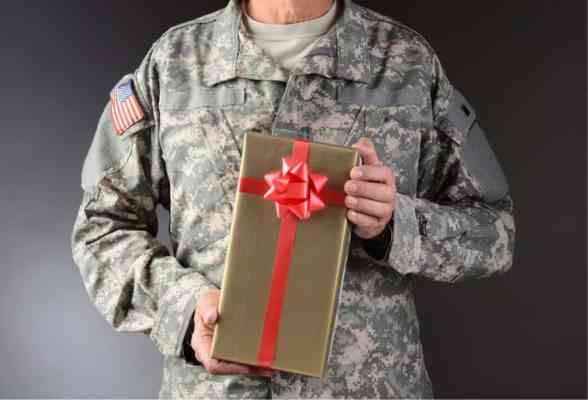 Soldier holding a gift